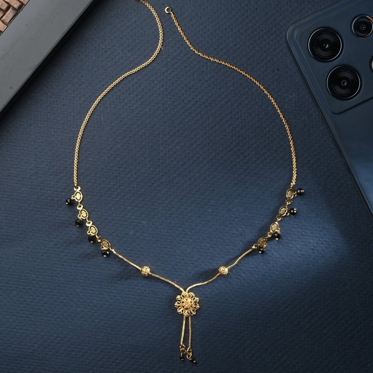 AanyaCentric Gold-Polished Jewelry Combo: Elegant Short Mangalsutra, Finger Ring, and American Diamond Earrings Set