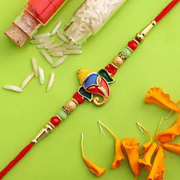 Divine Lord Ganesha Rakhi & Cashew Jar