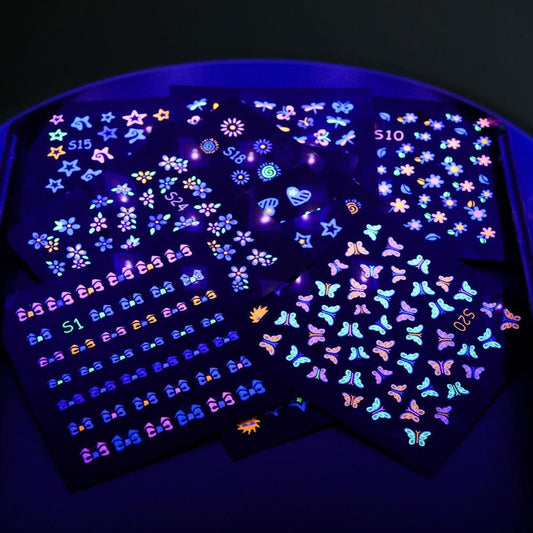 Fluorescent Flowers Nail Stickers Party Butterfly Night Glow Star Decoration Manicure Applique Sliders For Nails Design Fluorescent Light Flame Butterfly Moon Love Pattern Designs Nail Decal Decoration Tips For Beauty Salons Glow in Dark Nail Stickers