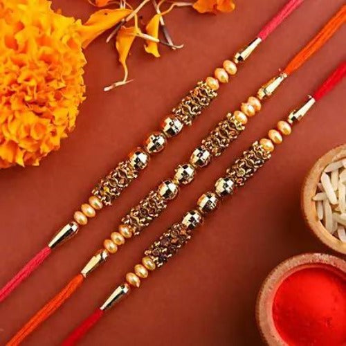 Set of 3 Traditional Pearl Rakhi and Kaju Rolls Box
