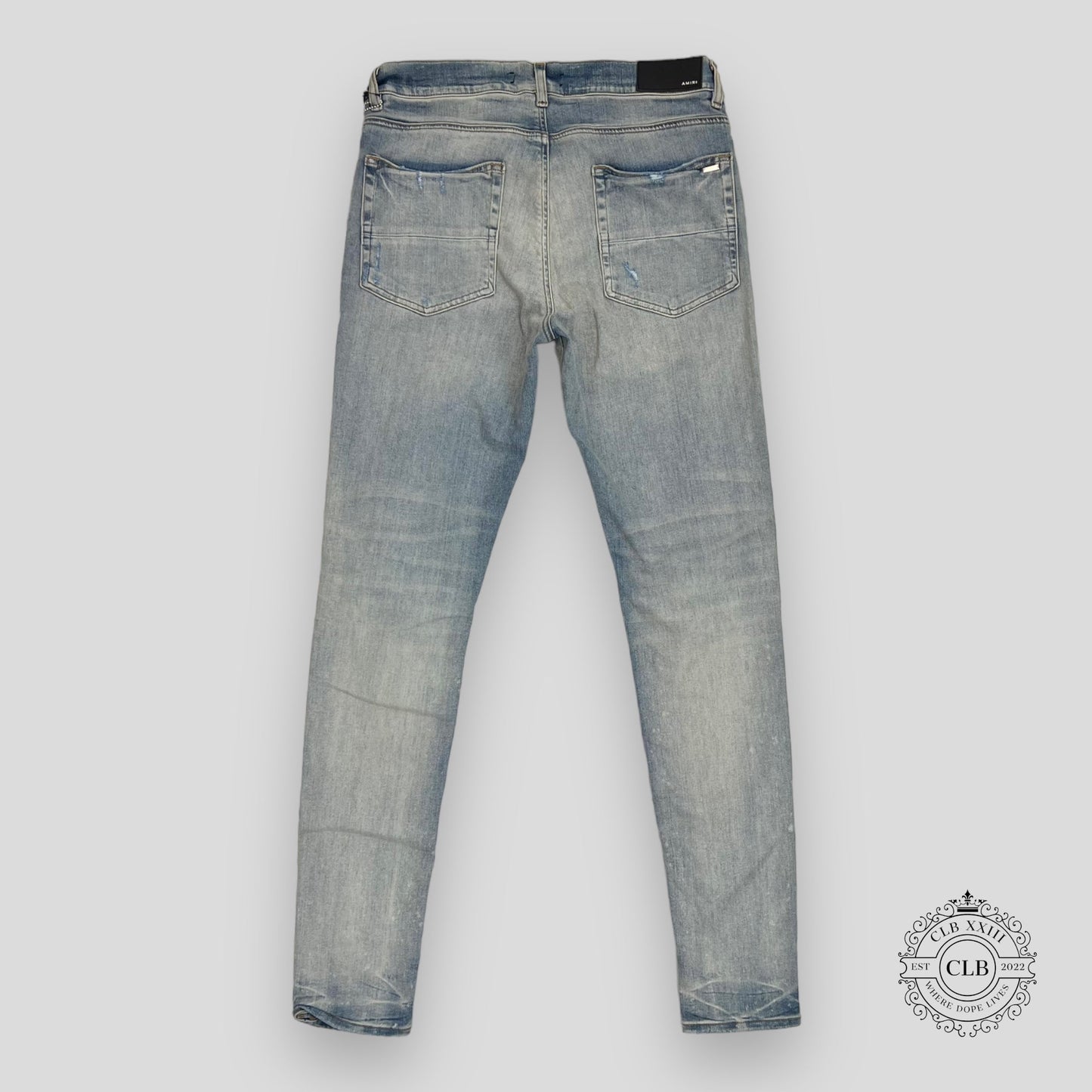 AMIRI MX1 CRACKED PAINT JEANS - CLAY INDIGO/PINK