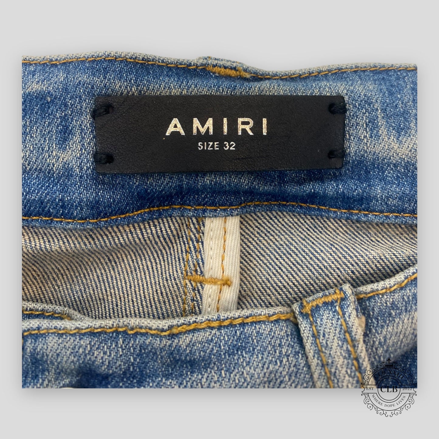 Amiri Hibiscus Stencil Jeans in Light Indigo