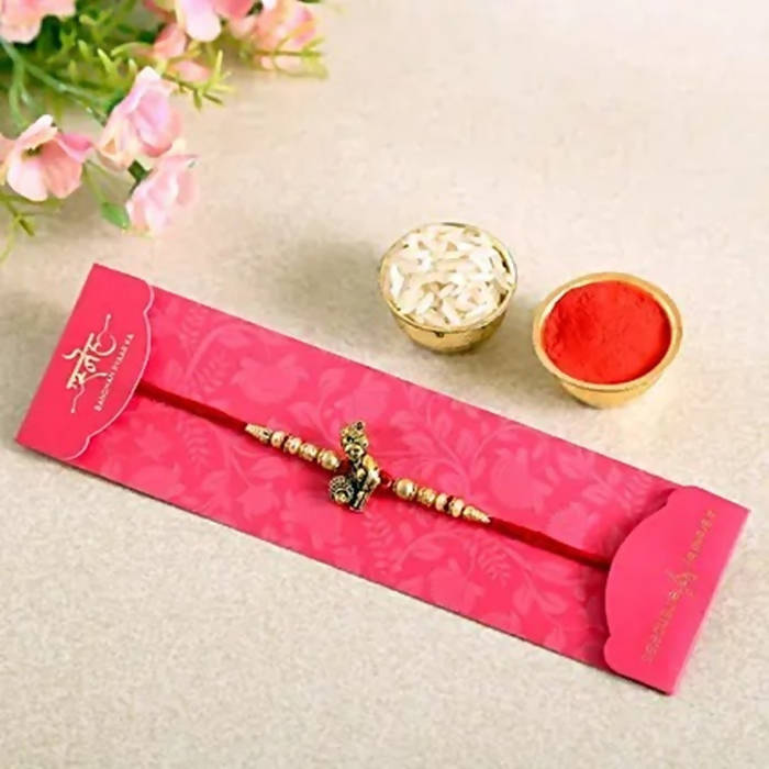 Divine Lord Krishna Pearl Rakhi & Kaju Roll Box