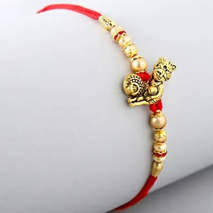 Divine Lord Krishna Pearl Rakhi & Kaju Roll Box