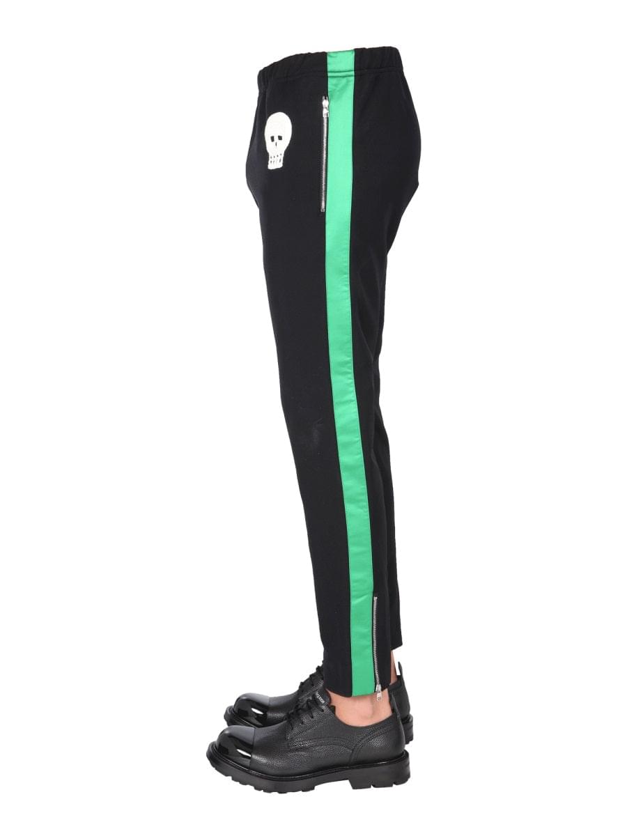 Alexander Mcqueen Men Jogging Pants With Embroidered Skull