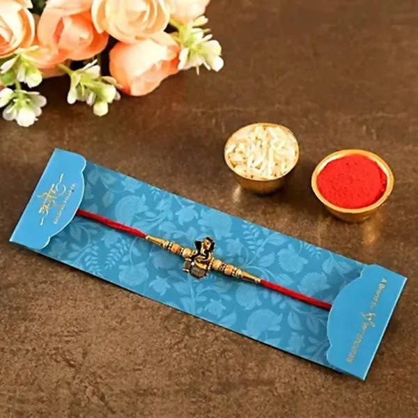 Devotional Lord Ganesha Rakhi & Kaju Roll Box