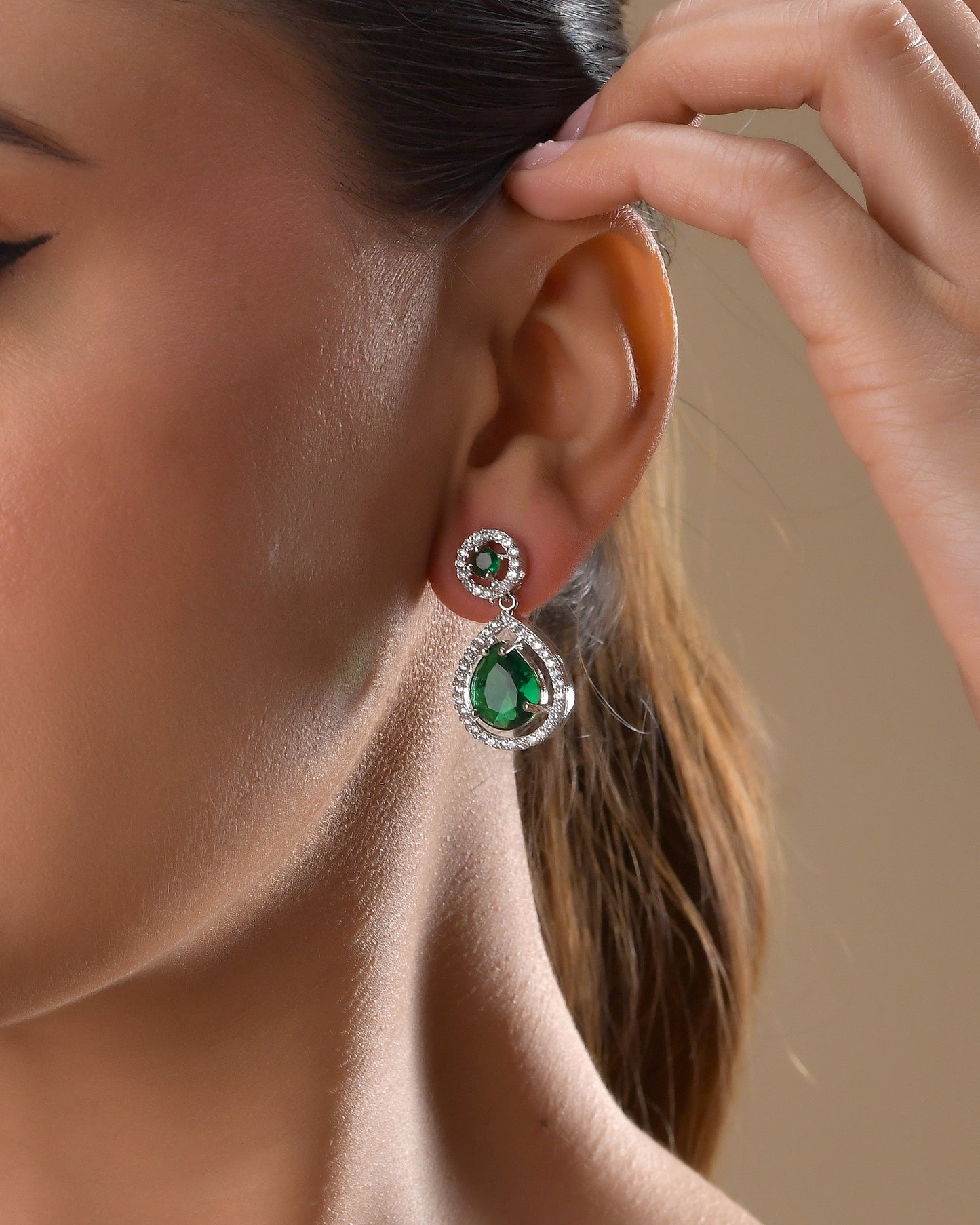 VOJ Silver Plated Green Stone Studded Teardrop Shaped Earrings