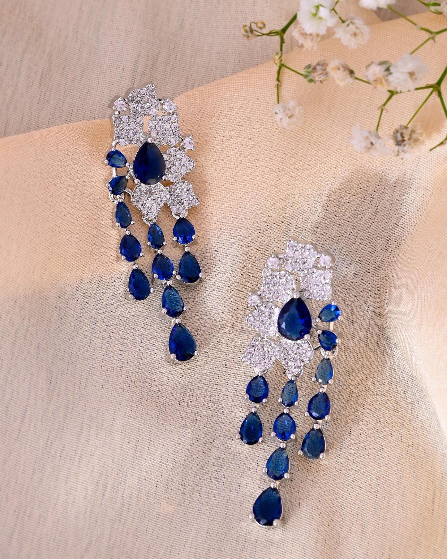 VOJ Silver Plated Ad And Blue Stone Studded Multi Layer Drop Earrings