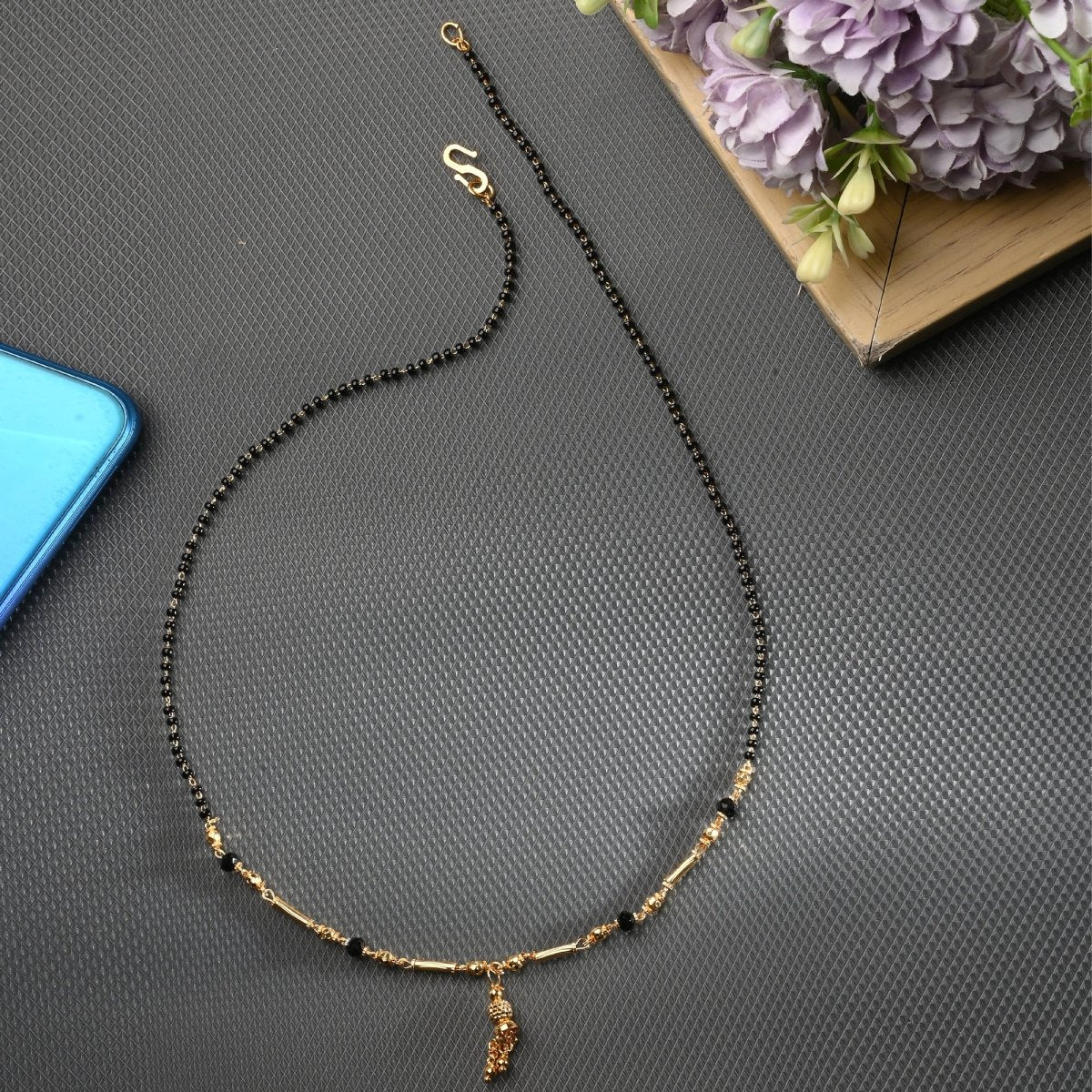AanyaCentric Gold-Polished Jewelry Combo: Elegant Short Mangalsutra, Finger Ring, and American Diamond Earrings Set