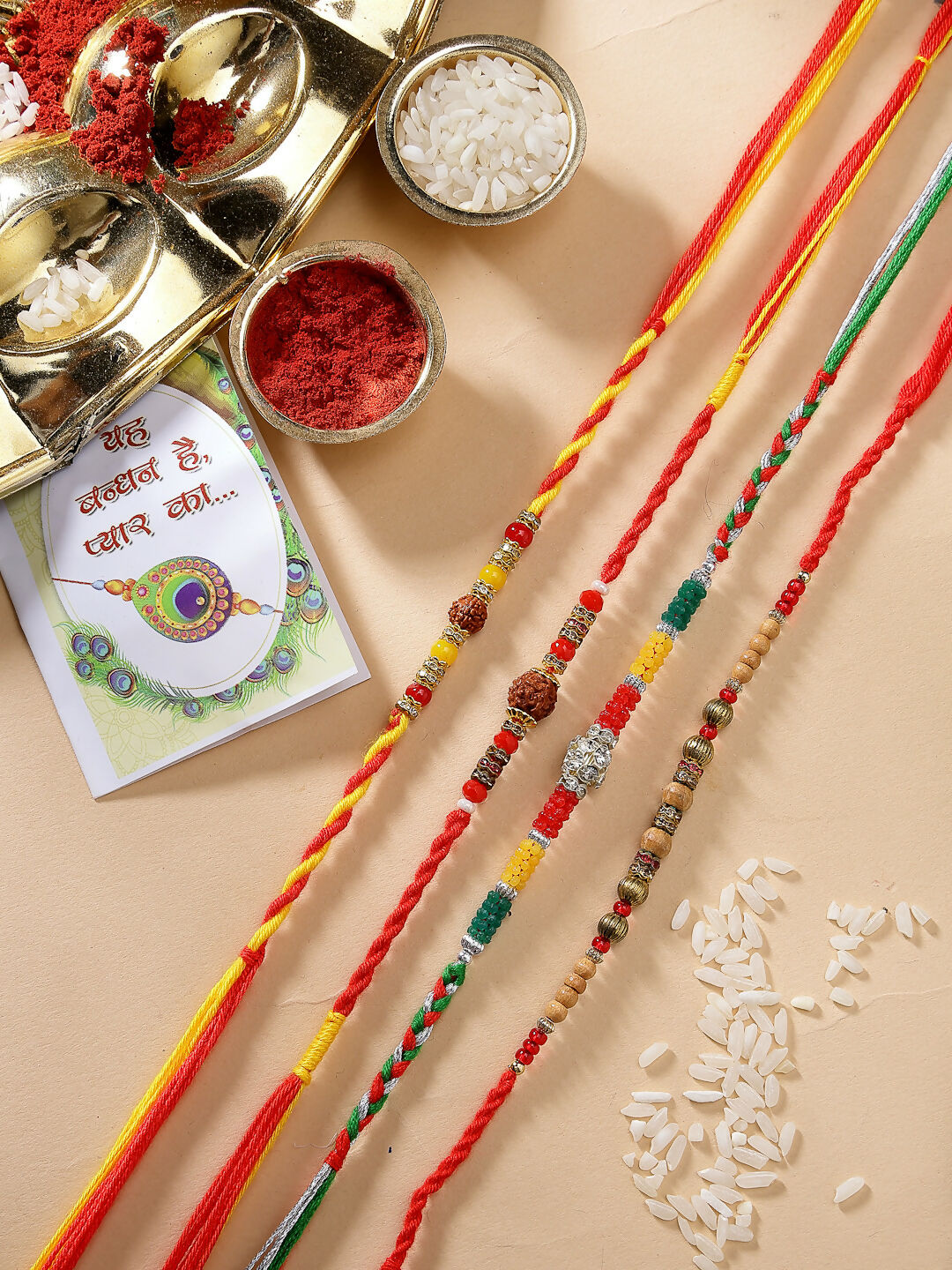 NVR Women & Men Set of 4 Multicolor Artificial stone and beads Rakhi With Roli Chawal