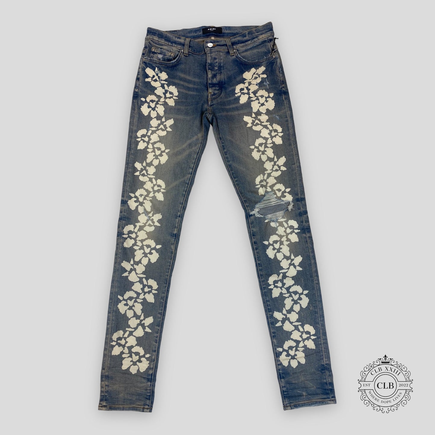 Amiri Hibiscus Stencil Jeans in Light Indigo