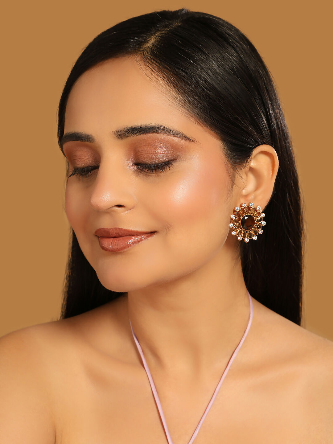 Nuyug 22K Gold Plated Faux Smoky Quartz & White Crystal Studded Contemporary Floral Shaped Studs