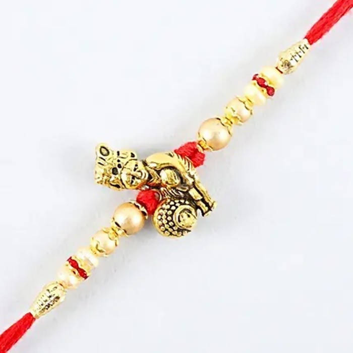 Divine Lord Krishna Pearl Rakhi & Kaju Roll Box